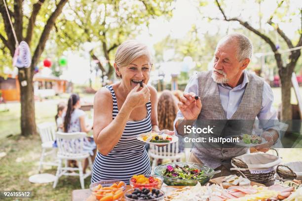 Family Celebration Or A Garden Party Outside In The Backyard Stock Photo - Download Image Now