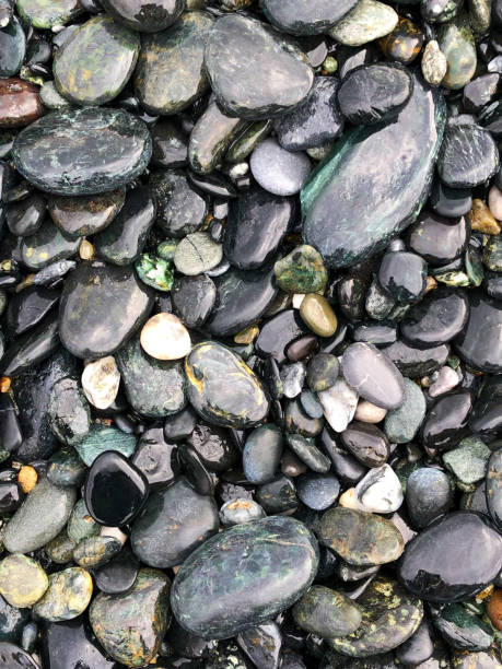 istock Wet stones on the beach 926159050