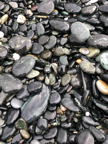 istock Wet stones on the beach 926159168