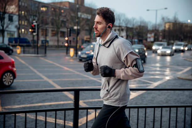 istock He Enjoys Jogging Through the City at Dusk 926159792