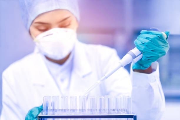 istock Young female scientist working in laboratory 926164306