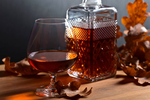 istock Brandy and dried up oak leaves . 926168490