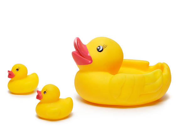 istock yellow rubber duck and ducklings 92617136