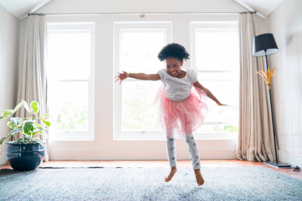 istock Girl performing ballet dance at home 926172146