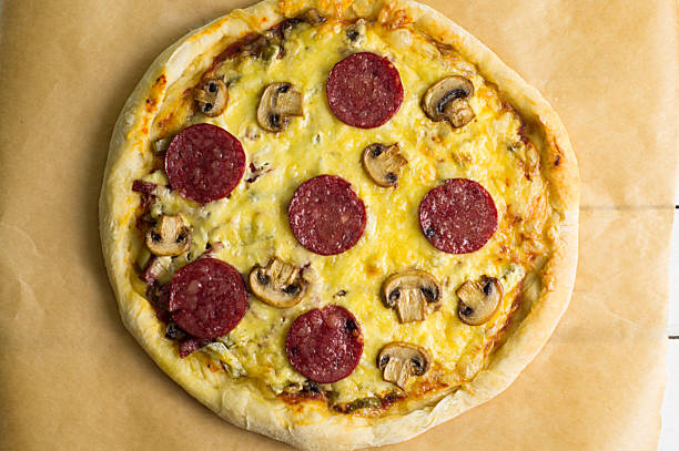 istock Sausage pizza pepperoni, cheese and mushrooms 926175342