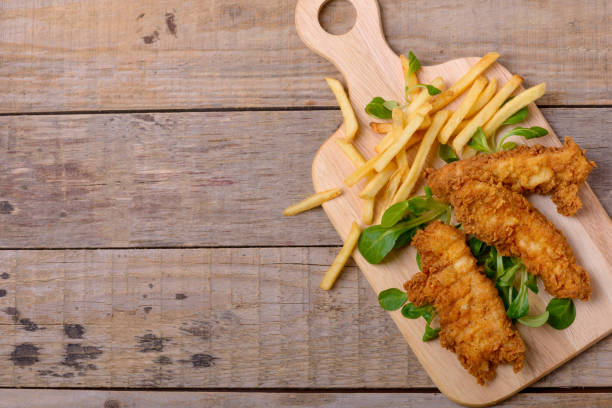 istock Strips chicken breas in seasoning for crispy outside 926175548