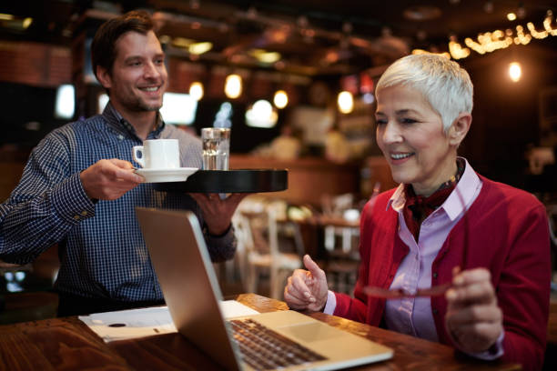 istock Waiter in coffee shop 926175646
