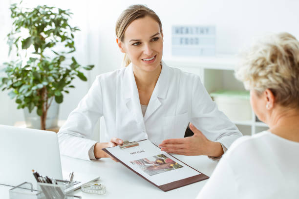 istock Female doctor introducing healthy diet 926176078