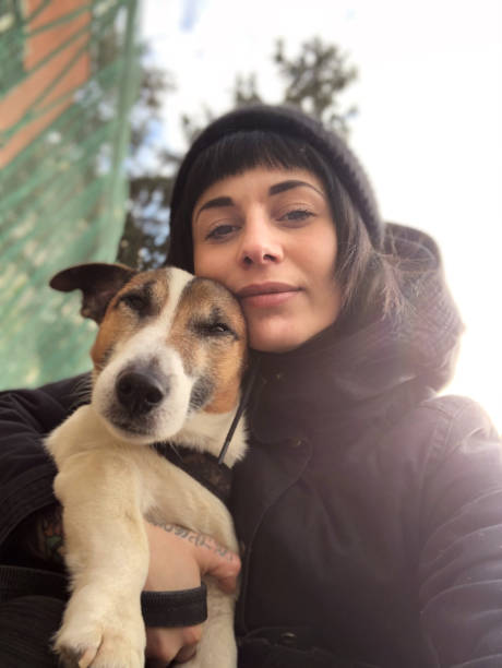 Beautiful young woman with dog