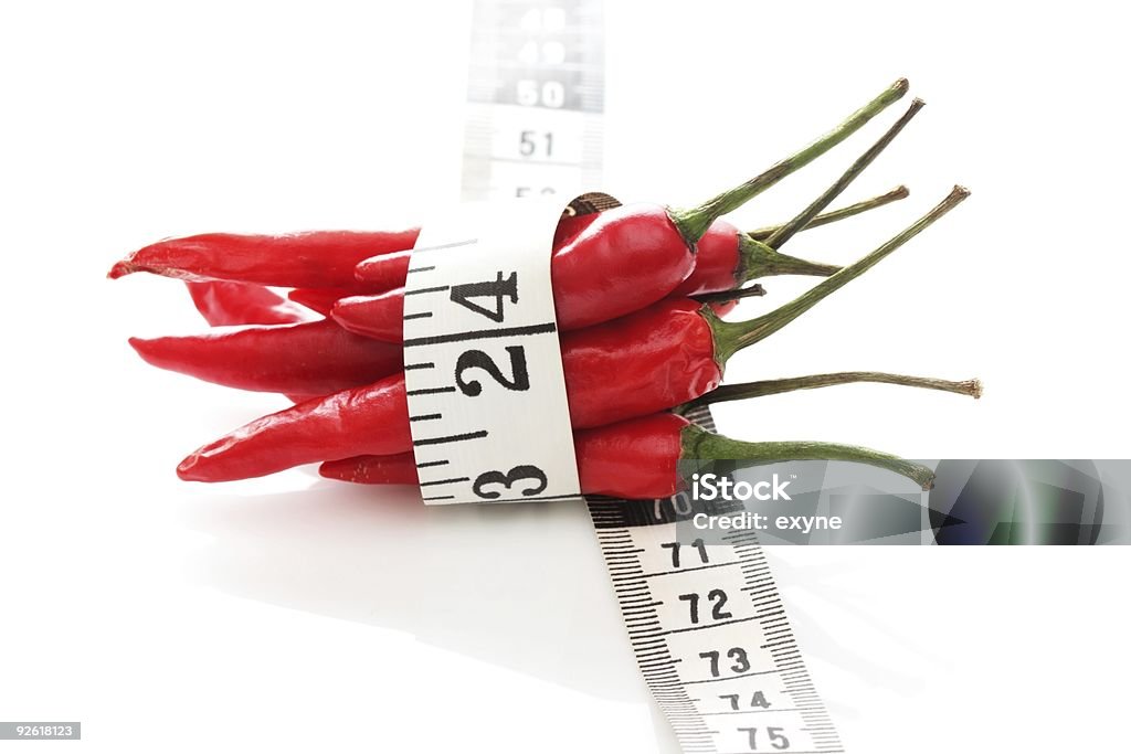 Chili bound with a measuring tape  Bunch Stock Photo