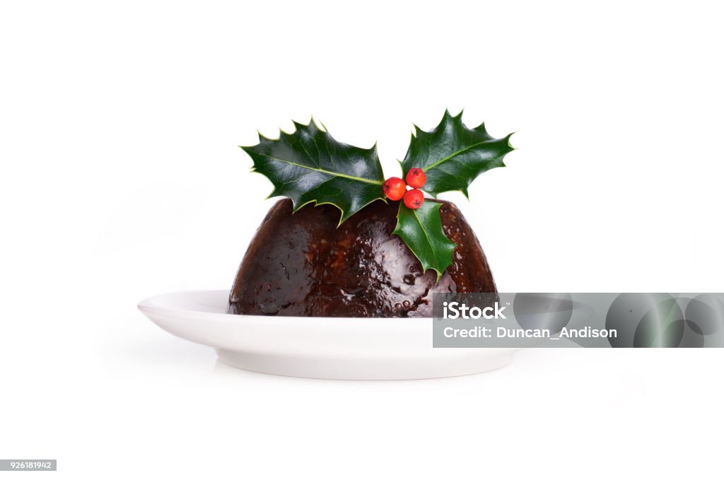 Christmas Pudding Christmas Pudding Witha Sprig Of Holly Isolated On A White Background. Christmas Pudding Stock Photo