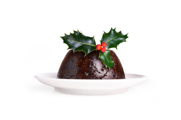 Christmas Pudding Christmas Pudding Witha Sprig Of Holly Isolated On A White Background. christmas pudding stock pictures, royalty-free photos & images