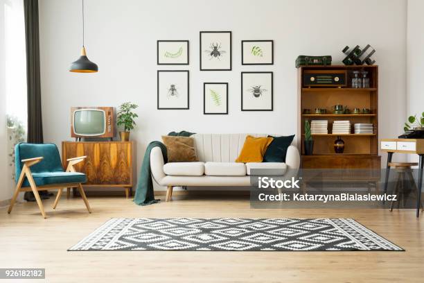 Vintage Tv Next To Couch Stock Photo - Download Image Now - Living Room, Rug, Domestic Room