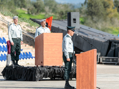 Mishmar David, Israel, Februar 21, 2018 : Officers of the IDF stand still while performing the anthem of Israel Atikva at the formation in Engineering Corps Fallen Memorial Monument in Mishmar David, Israel