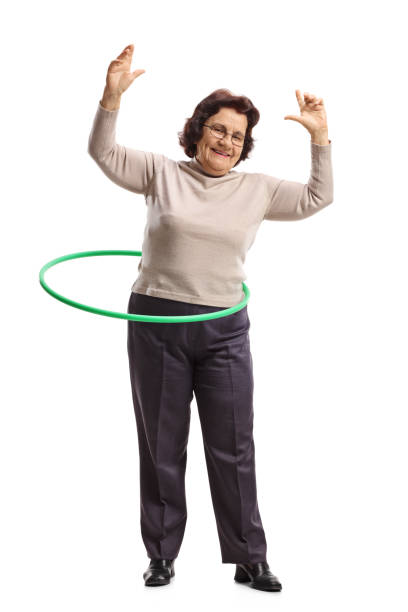 istock Elderly woman with a hula-hoop 926186680