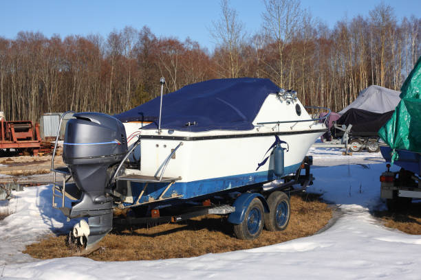 istock Winter boats parking - boat on trailer 926189948