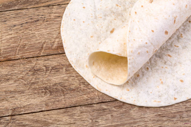 istock tortilla  on wooden table 926200264