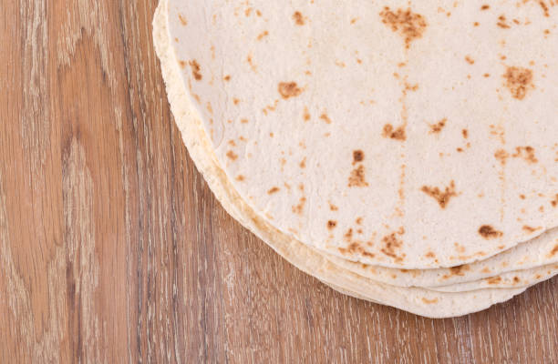istock tortilla  on wooden table 926200296