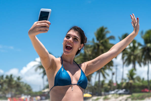 istock Woman taking a selfie at Beach 926207564