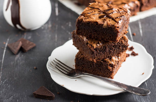 istock Chocolate brownie cake piece stack on plate homemade pastries 926211814