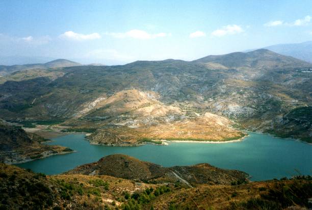 Scenic panoramic view of lake in the Sierra Nevada, Andalusia, Southern Spain.