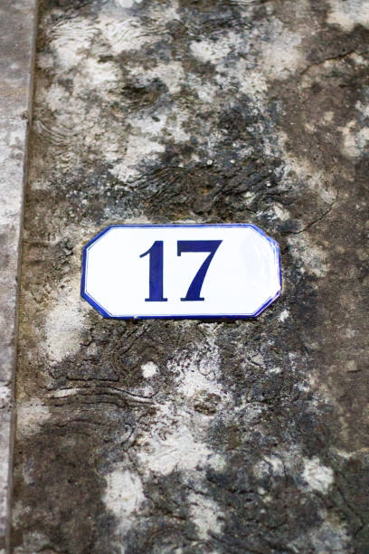 istock Italy: Antique Ceramic Number 17 Street Address Tile; Old Wall 926215888