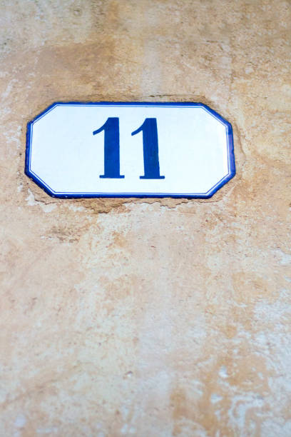 istock Italy: Antique Ceramic Number 11 Street Address Tile; Old Wall 926216098