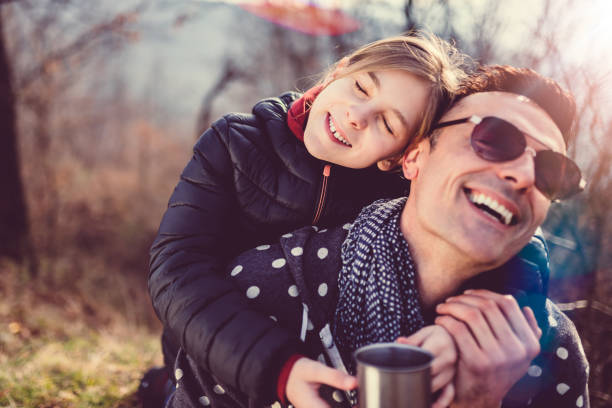 istock Daughter embracing her father 926216128