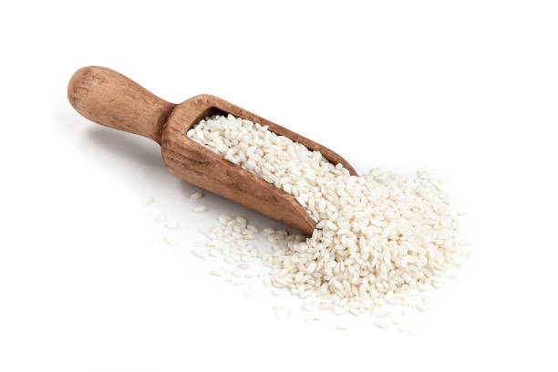 白い背景で撮影提供スクープ バスマティ ライス - clipping path rice white rice basmati rice ストックフォトと画像