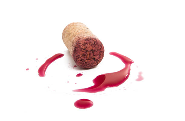 istock wine cork with drops of red wine 926224196