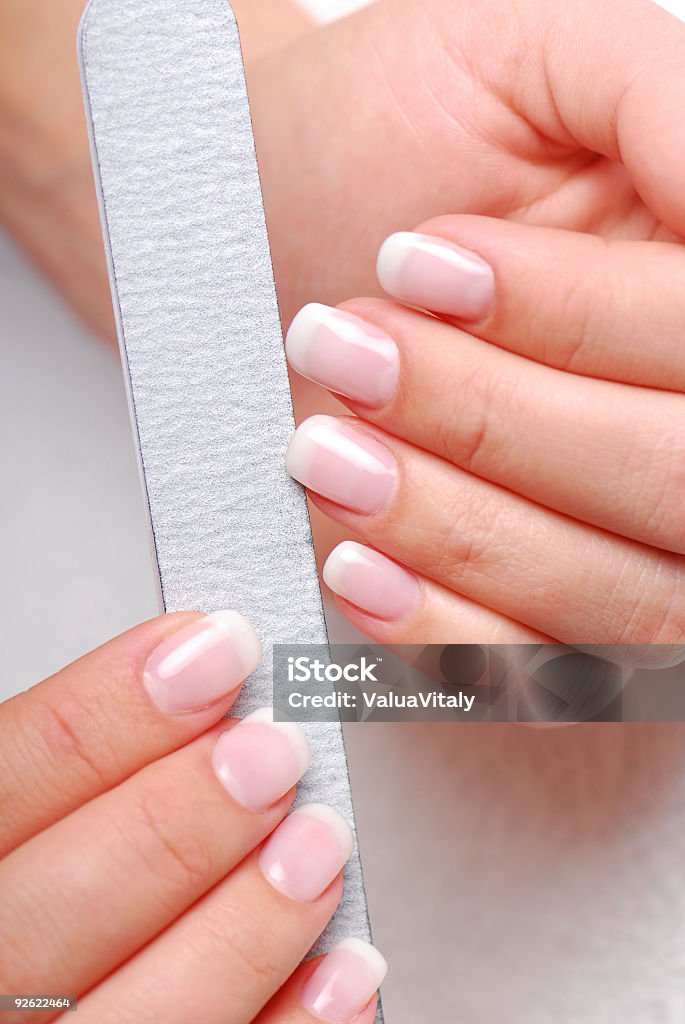 fingernails de pulido - Foto de stock de Abrillantar libre de derechos