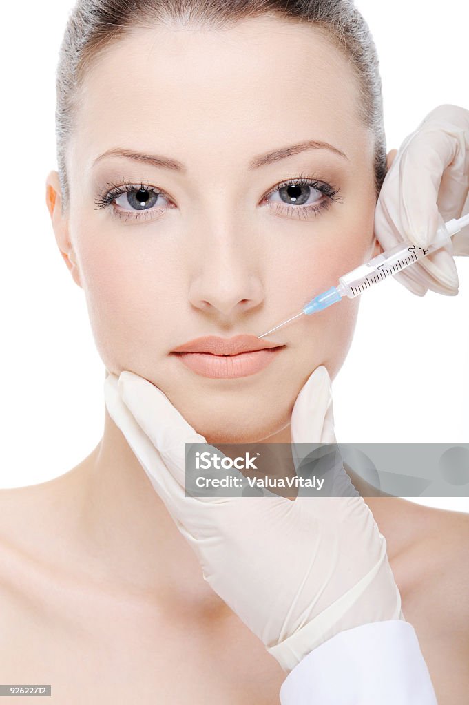 giving  injection of botox  20-29 Years Stock Photo