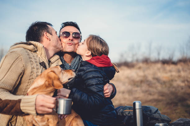 istock Gay parents with daughter and dog 926227268