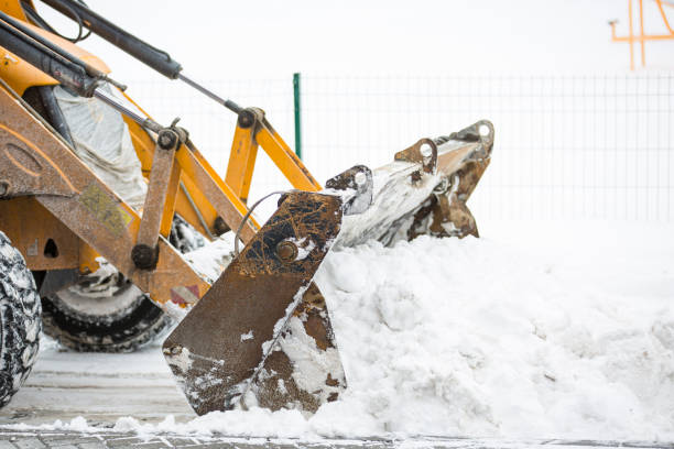 istock Snow removal by tractor in the city 926230686