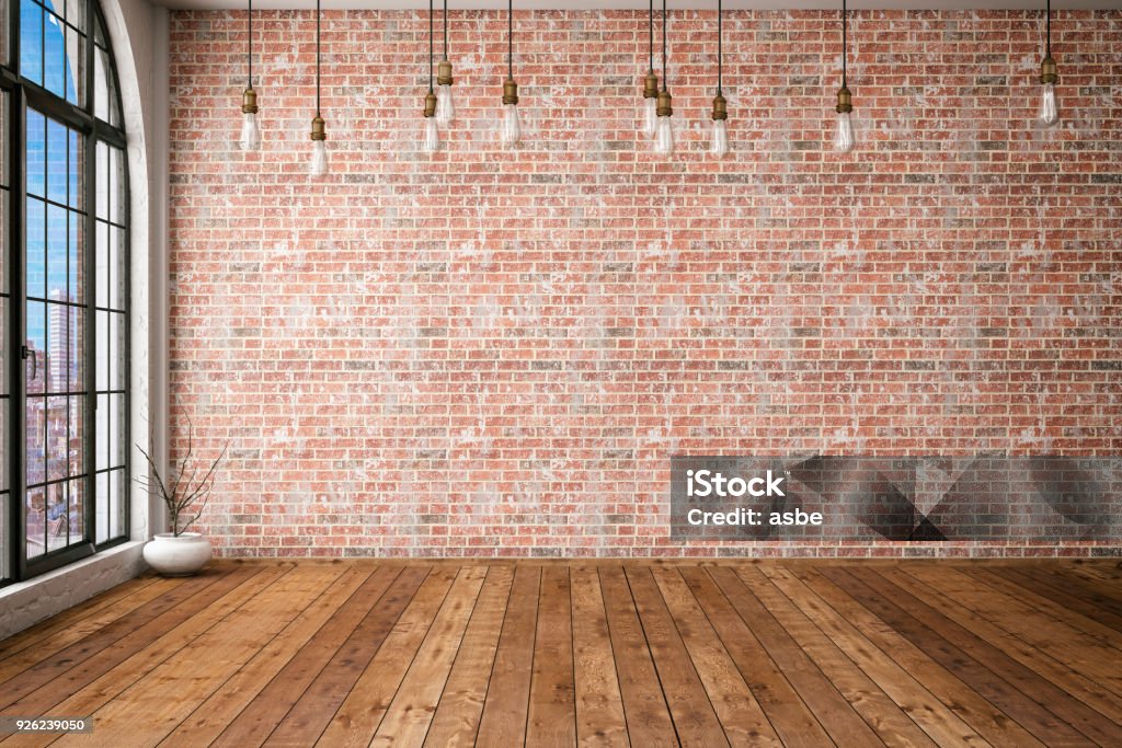 Empty Brick Wall Empty brick wall with edison lights Brick Wall Stock Photo