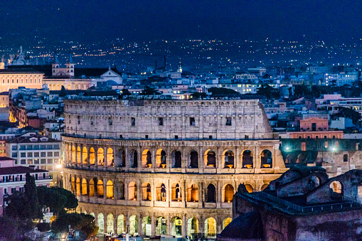 Night scene aerial of rome coliseum view from Vittorio Emanuele II viewpoint, Rome, Italy