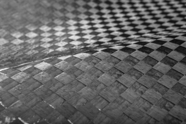 istock Carbon fiber material wit large squares 926246630