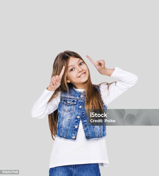 Cute Little Girl Pointing Up Stock Photo - Download Image Now - Humor, Child, Fun