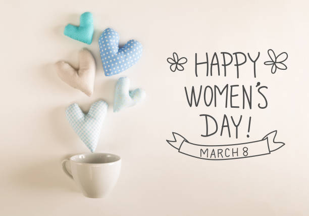 Women's Day message with blue heart cushions