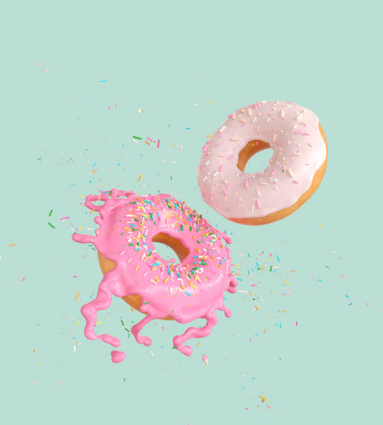 flying pink and white doughnut - candied sugar imagens e fotografias de stock
