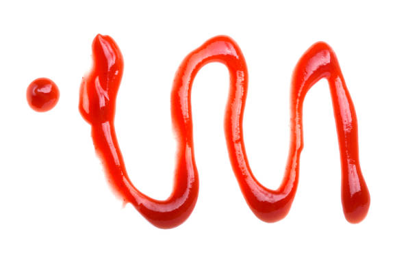 istock Closeup red ketchup tomato sauce isolated on white background 926253628