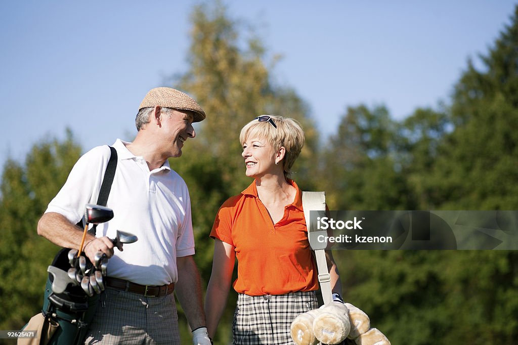 Casal jogando golfe - Foto de stock de Golfe royalty-free