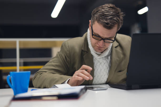 istock Businessman using smartphone in the office 926260550