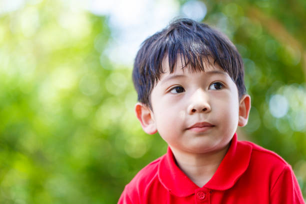 istock Little boy wearing red shirt 926260564