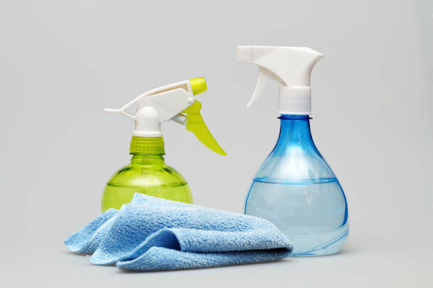 istock Bottles with spray and sponges for cleaning on a white background 926261026