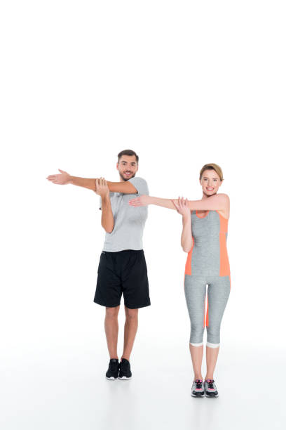 istock sportive couple warming up before training isolated on white 926268838