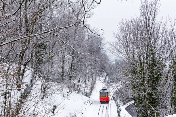 the historical sassi- superga ( turin-italy) rack tramway in winter time. - rack railway imagens e fotografias de stock