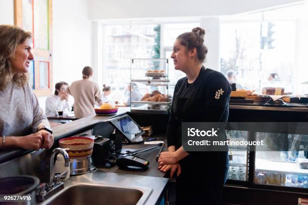 Customer Service In A Small Local Bakery Shop Stock Photo - Download Image Now - Bakery, Business, Community
