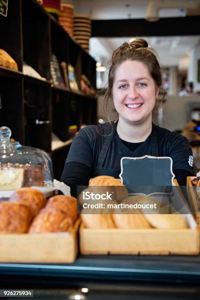 Customer Service In A Small Local Bakery Shop Stock Photo - Download Image Now - Bakery, Community, 30-34 Years