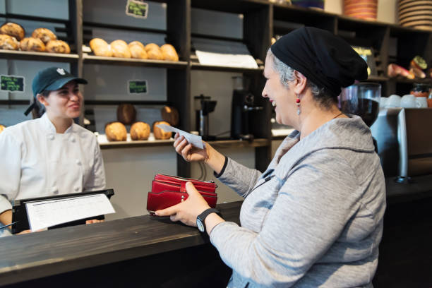 Customer service in a small local bakery shop.